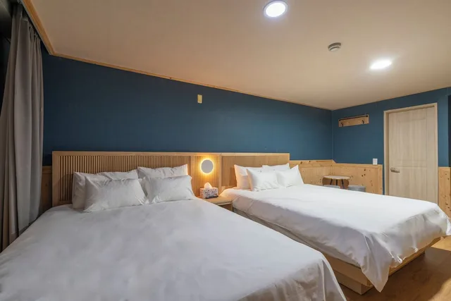 غرفة رباعية بسريرين كوين، New Jeju Hotel 2/9