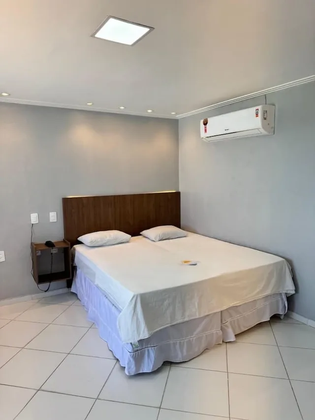 غرفة قياسية رباعية بسرير كوين وسريرين منفصلين، Hotel Luar De Itapua 1/9