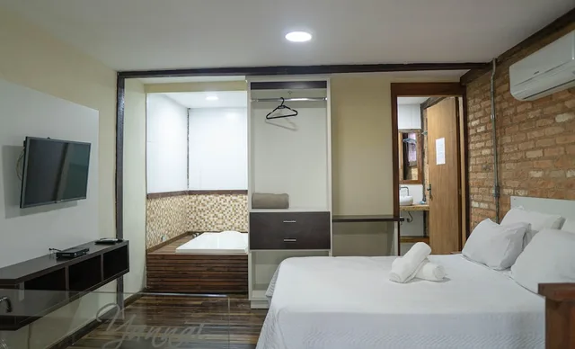 غرفة بريميوم بسرير كوين بإطلالة مع أريكة، Yannai Chalé Praia 4/10