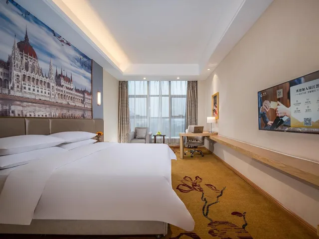 غرفة بزنس بسرير كوين، Vienna International Hotel (Nanjing Zhushan Road Metro Station) 1/4