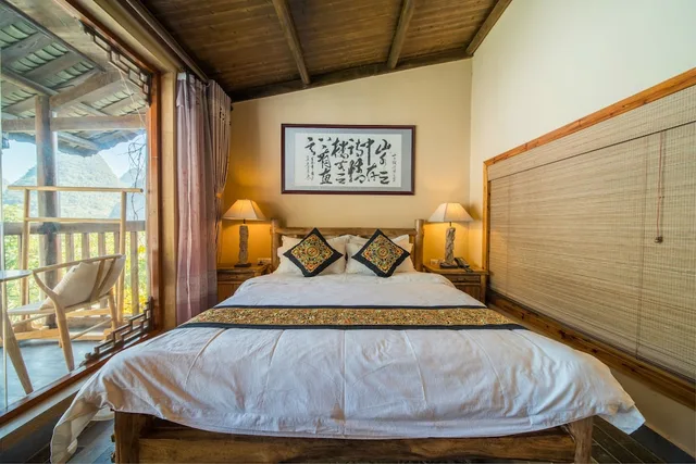غرفة ديلوكس بسرير كوين، Yangshuo Tea Cozy Boutique Hotel 5/7
