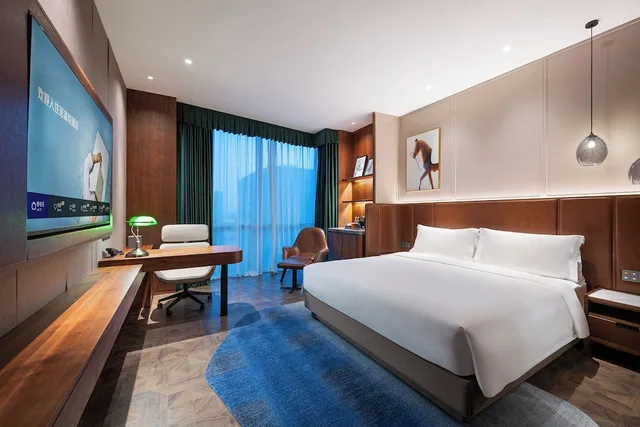 غرفة ديلوكس بسرير كينج، Novotel Shanghai Baoshan Jiusi 1/4