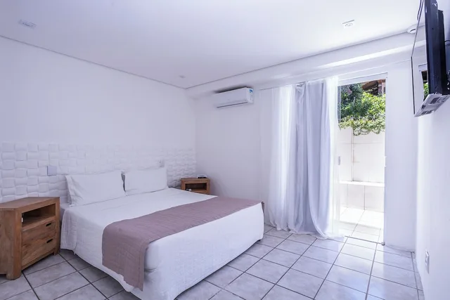 غرفة قياسية بسرير مزدوج وسرير فردي في الطابق الأرضي، Ilhabela Hotel 1/10