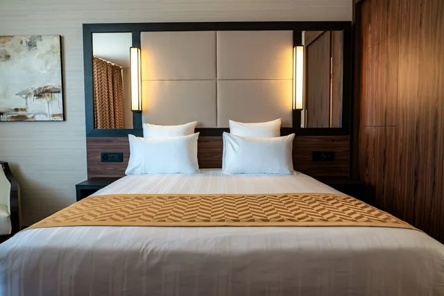 جناح جونيور بسرير كوين مع أريكة، Nash Suites Hotel 1/1