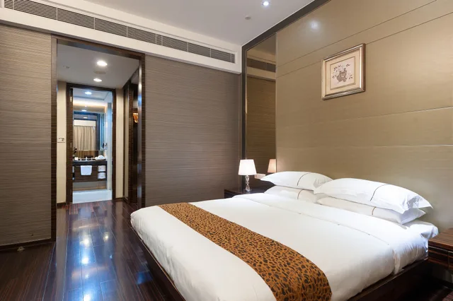 غرفة تنفيذية بسريرين كوين، Yicheng Apartment Poly World Center 2/4