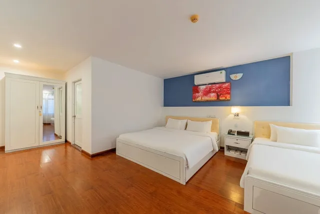غرفة ديلوكس عائلية بسرير كوين وسرير فردي، A25 Hotel - No. 137 Nguyen Du 1/10