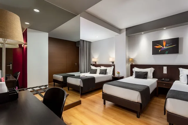 غرفة عائلية بسرير مزدوج وسريرين منفصلين، Hotel Luena 3/12
