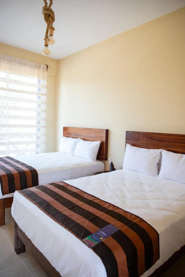 غرفة بسريرين مزدوجين، Hotel Santa Cruz Punta Zicatela 1/5