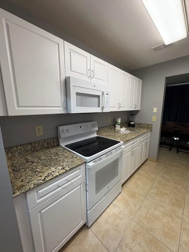 شقة سكنية ديلوكس بسريرين كوين وسريرين منفصلين مع أريكة، Villas At Fortune Place 5/10