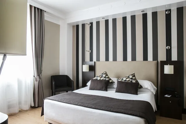 جناح استوديو عائلي مع أريكة، Th Roma Carpegna Palace 1/9
