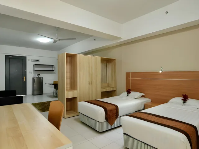 شقة بريميير بسرير كينج وسريرين منفصلين بغرفة نوم واحدة، One-Stop Residence & Hotel 1/2