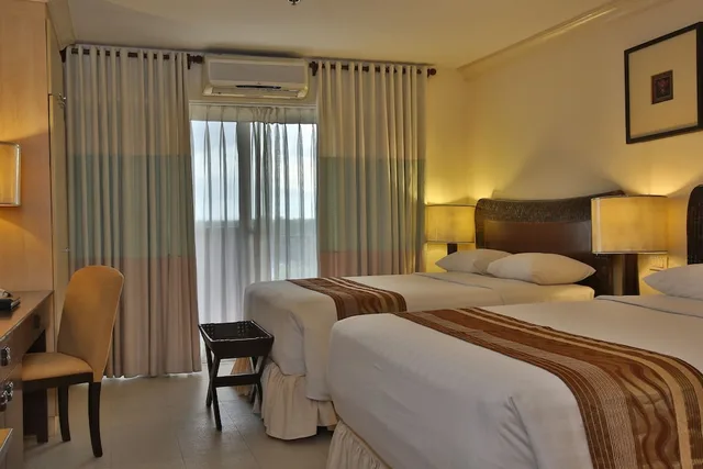 جناح بسرير مزدوج وسرير فردي بغرفة نوم واحدة، Crown Regency Suites Mactan 2/10