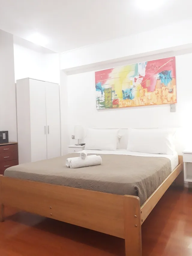 غرفة كلاسيكية ثلاثية بسرير كوين وسرير فردي بغرفة نوم واحدة، Tremo Parque Bustamante 2/8