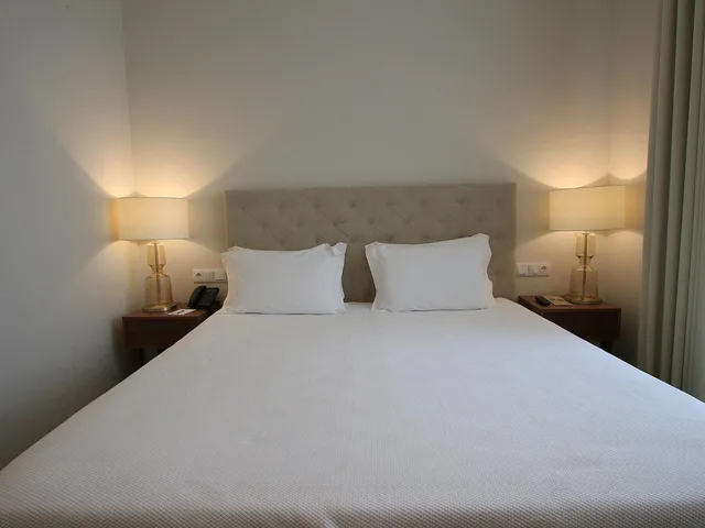 غرفة بريميوم بسرير كوين مع أريكة، Consolata Hotel 3/4