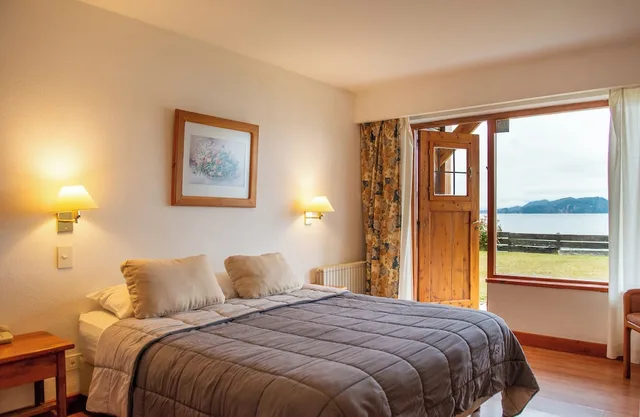 شقة عائلية بسرير كوين بإطلالة على البحيرة بغرفة نوم واحدة مع أريكة، Apart del Lago 4/9