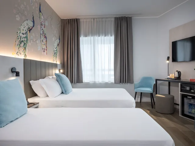 غرفة عائلية، iH Hotels Milano Centrale 1/8
