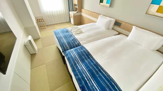Hollywood, Twin Beds, Bathtub، Okinawa Hinode Resort And Hot Spring Hotel 2/3