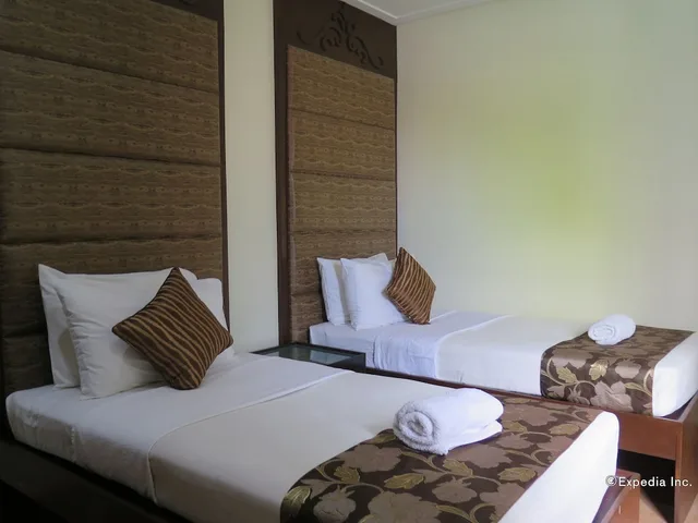 غرفة ديلوكس بسريرين منفصلين، 717 Cesar Place Hotel 1/3