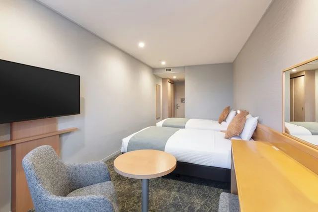 غرفة بسريرين منفصلين، Kusatsu Onsen Hotel Resort 3/4