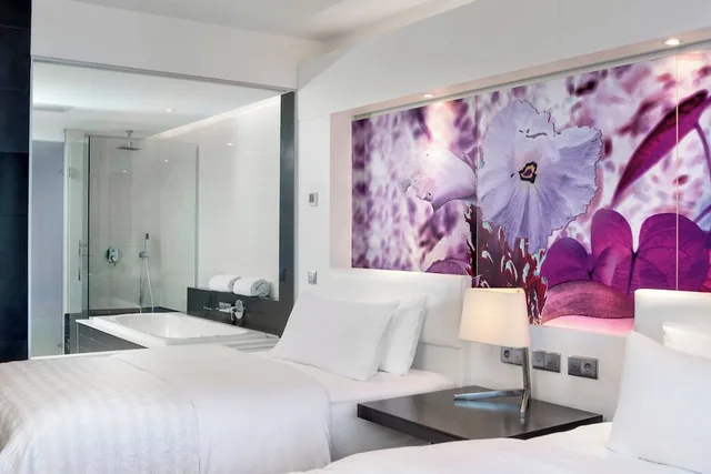 غرفة بسريرين منفصلين بإطلالة على الحديقة بشرفة، Le Meridien Noumea Resort Spa 1/4