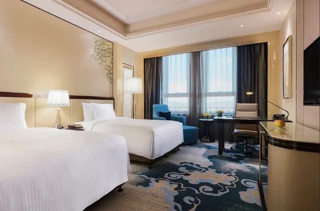 غرفة ديلوكس بسريرين منفصلين، Wanda Realm Chifeng Hotel 1/2