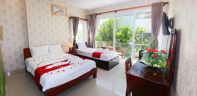 غرفة عائلية بسريرين مزدوجين بإطلالة على الحديقة، Hai Yen Resort 7/10
