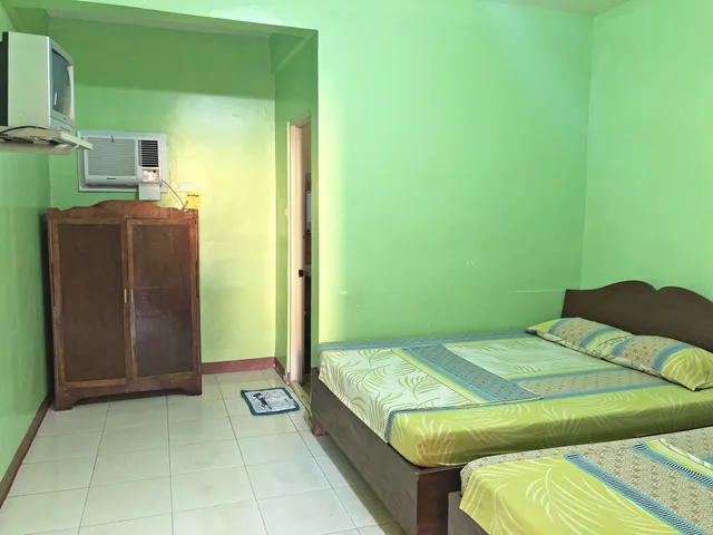 غرفة ديلوكس بسريرين كوين، Queen Of Isle Restaurant And Cottages 3/3
