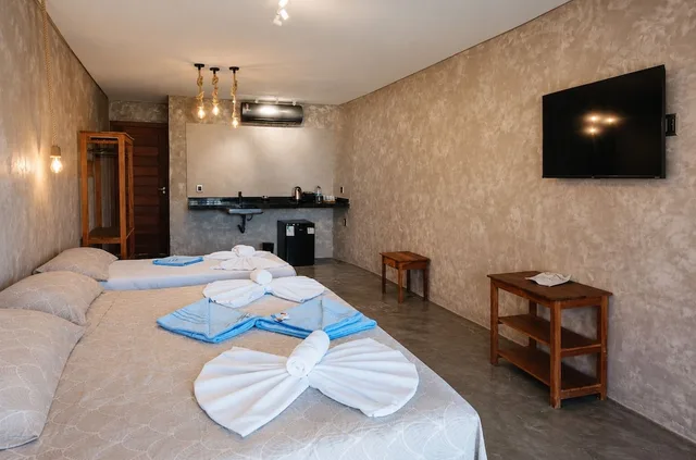 غرفة كلاسيكية ثلاثية بإطلالة جزئية على البحر، Arraial Praia Hotel Pousada 1/3