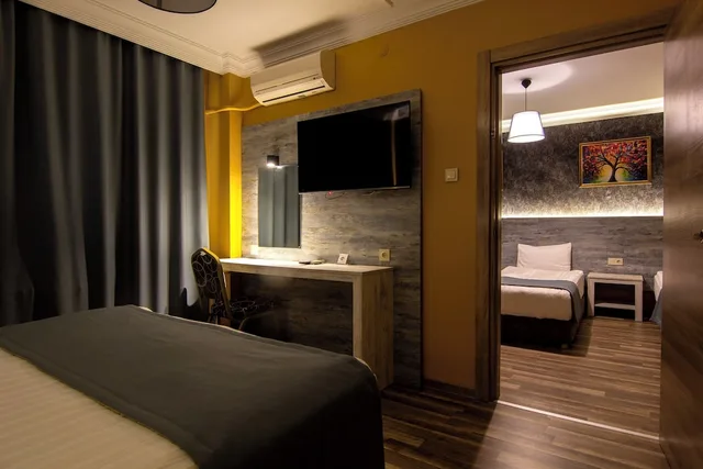 غرفة ديلوكس رباعية بغرفتي نوم، Baykara Hotel 2/2