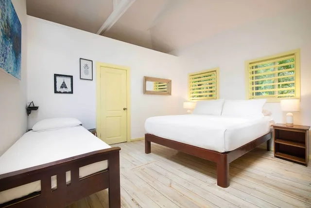 2 Bedrooms, Garden Villa, 1 Single and 2 Queen Beds، Puerta Azul Hotel 1/4