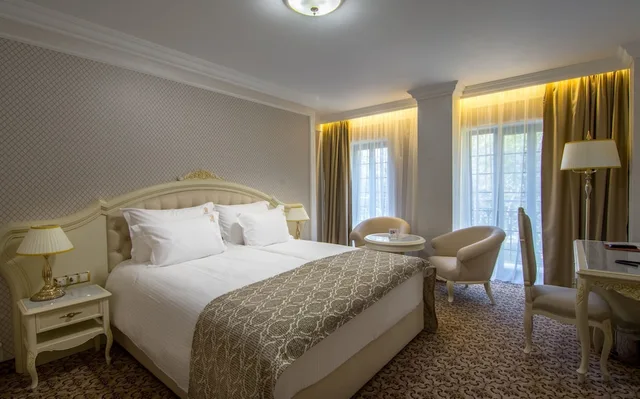 غرفة ديلوكس بسرير كينج بشرفة، Hotel Residence City Garden 4/7