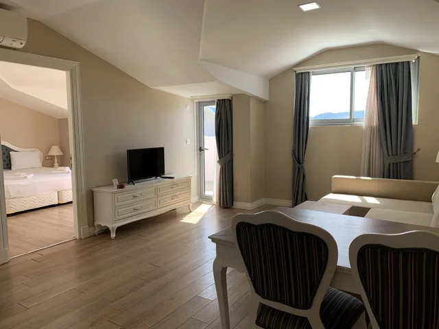 غرفة اقتصادية بسرير كوين مع أريكة، Daphne Residence 5/10