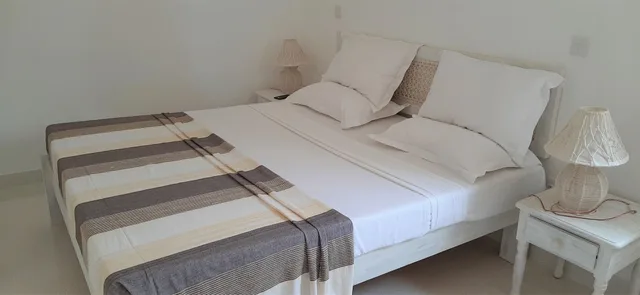 جناح ديلوكس بسرير كوين بإطلالة على الحديقة بغرفة نوم واحدة مع أريكة، Life Resort St.Thomas Royal Palm 2/6