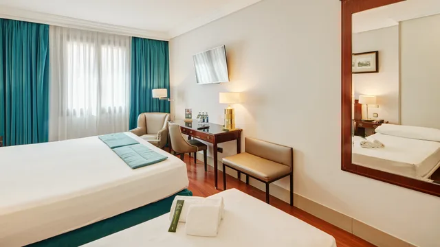 غرفة كلاسيكية ثلاثية بسرير مزدوج، Sercotel Gran Hotel Conde Duque 2/6