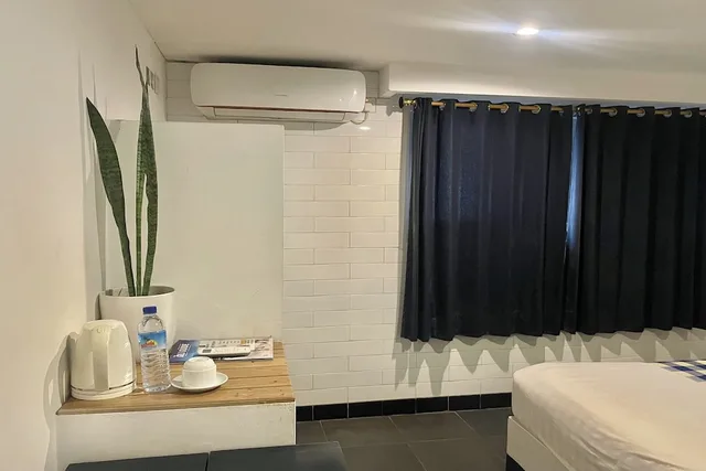 غرفة قياسية بسرير كوين، Taman Unique Hotel 9/10