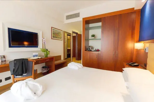 غرفة كلاسيكية بسرير مزدوج أو سريرين منفصلين، Hotel Nettuno 1/3