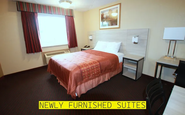 جناح ديلوكس بسريرين مزدوجين مع أريكة بمطبخ صغير، Travel Inn and Suites Flemington 4/7