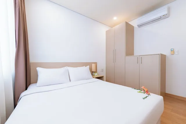 شقة ديلوكس بسرير كوين وسرير مزدوج بإطلالة على المدينة بغرفتي نوم، G8 Center Hotel Saigon 1/10