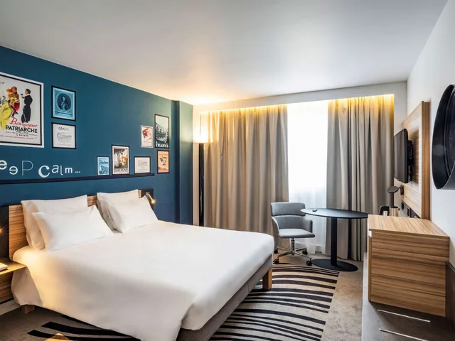 غرفة كلاسيكية بسرير مزدوج مع أريكة، NOVOTEL BEAUNE 1/10