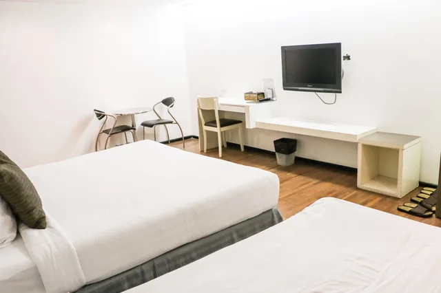 غرفة ديلوكس ثلاثية بسرير كينج وسرير فردي، The Mini R Ratchada Hotel 1/4