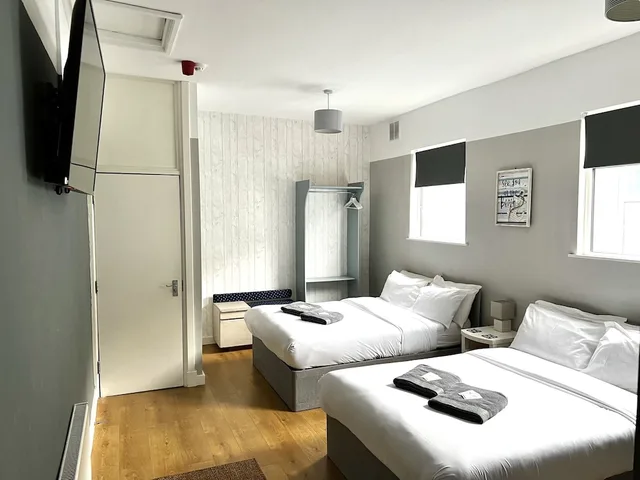 شقة عائلية بسريرين كوين مع أريكة، Central Cove Guesthouse 1/4