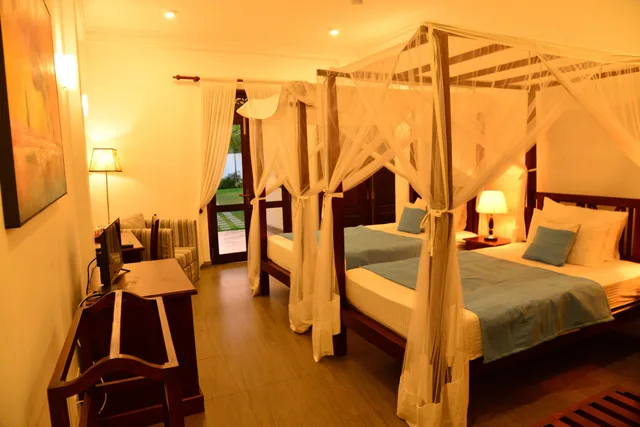 جناح متصل عائلي ديلوكس بسريرين منفصلين وسرير كينج بغرفتي نوم، Villa Shanthi 5/8