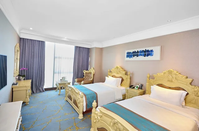 غرفة بسريرين منفصلين بإطلالة على الحديقة، Nan Yang Royal Hotel 1/4