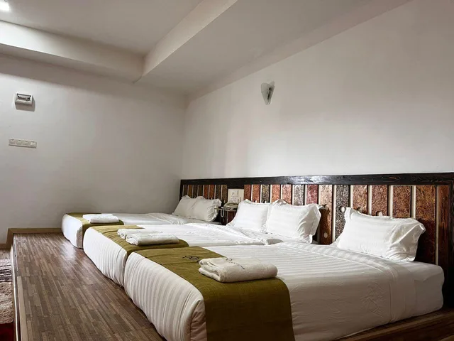 غرفة سوبيريور عائلية بسرير فردي وسريرين كوين، S8 Boutique Hotel 2/3