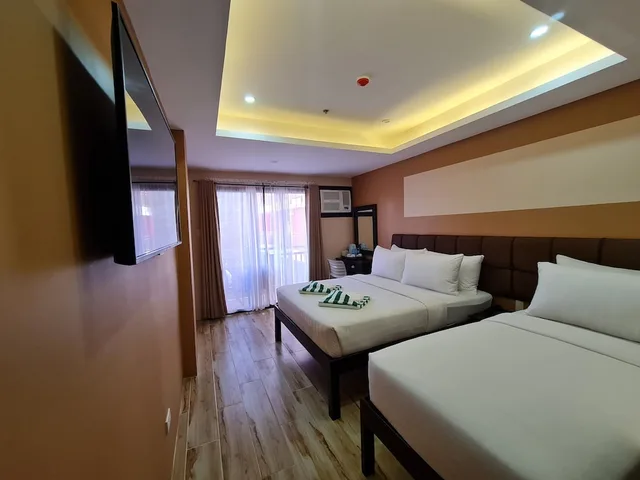 Superior, 1 Queen and 1 Single Bed, Red Coco Inn de Boracay 2/3
