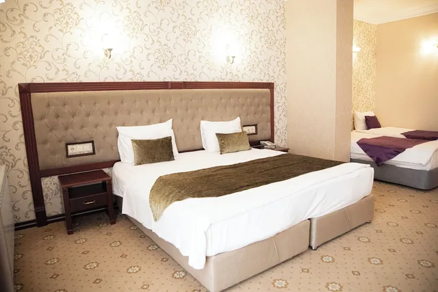 غرفة كومفورت ثلاثية بثلاثة أسرّة، Capitol Hotel 2/5