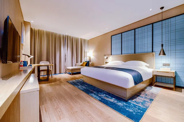 غرفة بزنس بسرير كينج، Echarm Hotel (Guizhou Xingyi Jushan Avenue) 1/1