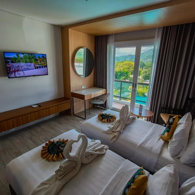 غرفة ديلوكس بسريرين منفصلين بإطلالة على المسبح، Raja Hotel Kuta Mandalika Resort & Convention 8/10