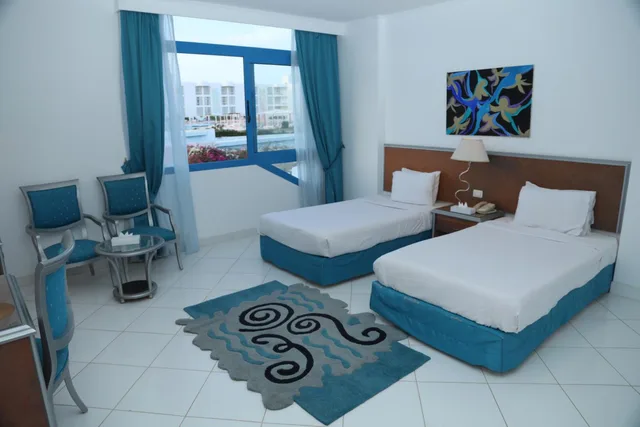 غرفة بسرير مزدوج أو سريرين منفصلين بإطلالة على البحر، Amarina Star Resort & Aqua Park 5/10