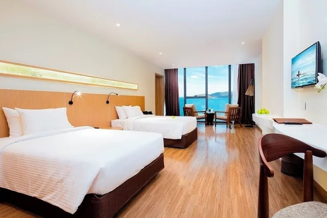 غرفة متصلة عائلية بسرير كينج وسريرين منفصلين بإطلالة على البحر، Starcity Bayfront Nha Trang Hotel 2/10